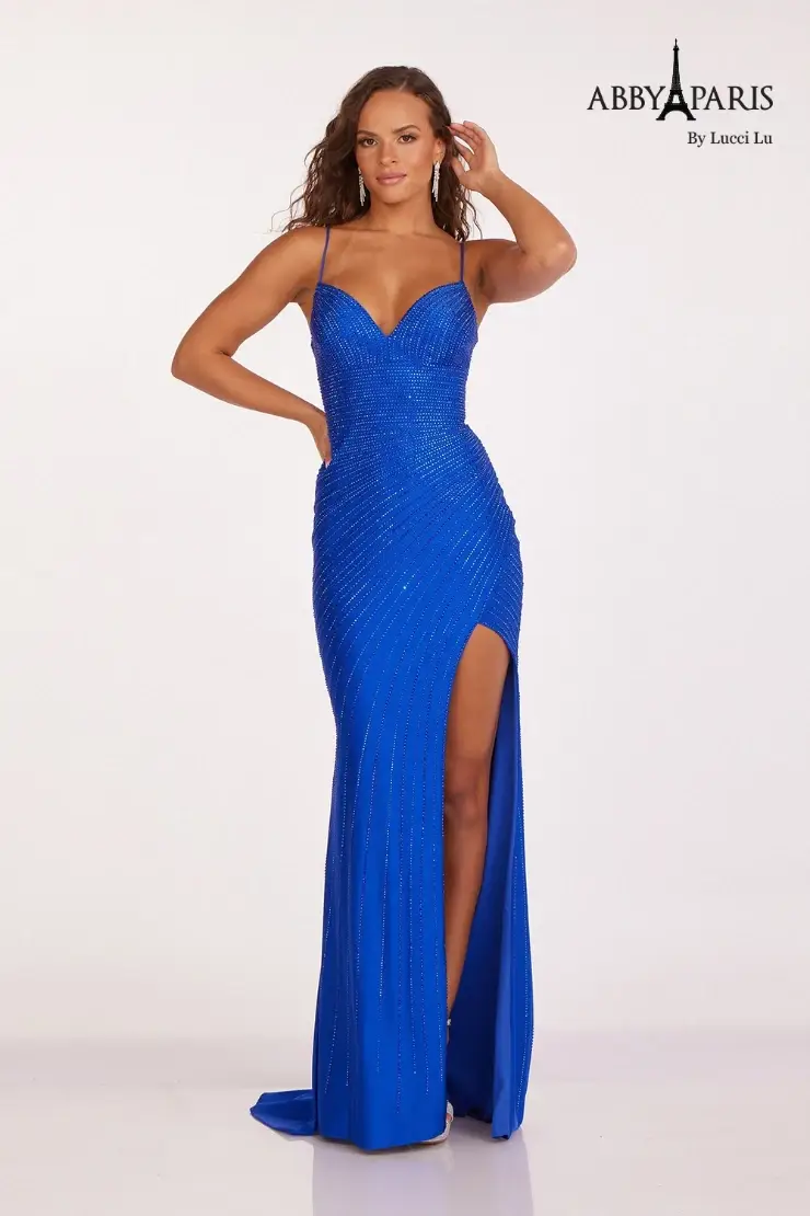 model is wearing a sleeveless royal blue prom dress
