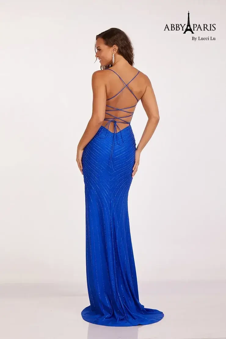 model is wearing a sleeveless royal blue prom dress