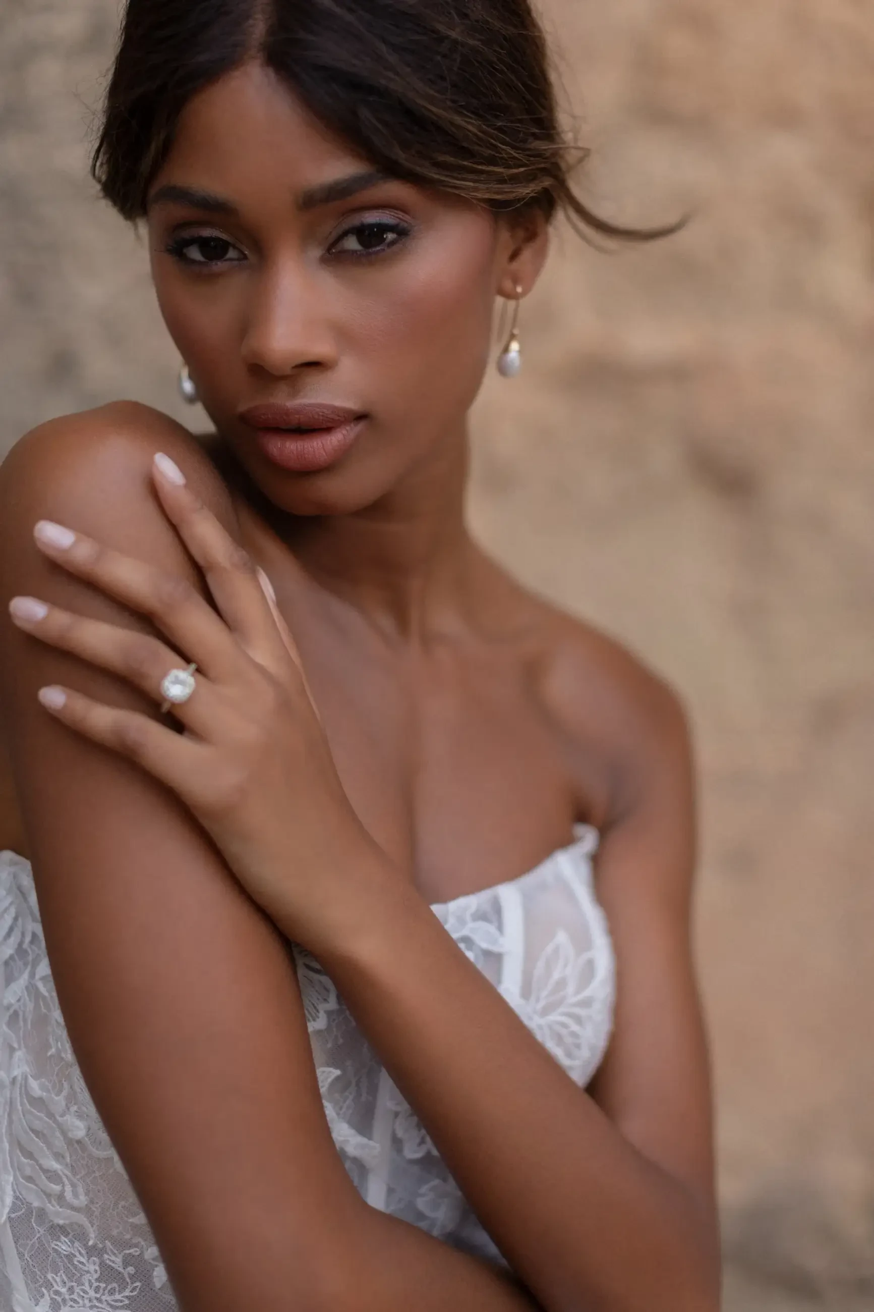 model is wearing a scoop neck a-line wedding dress